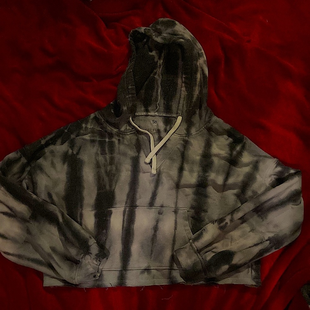 Tie dye hoodie with white straps to adjust hood size.